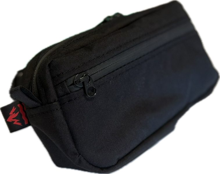 Front three quarter view of a black Towpath Pack in 500D Cordura